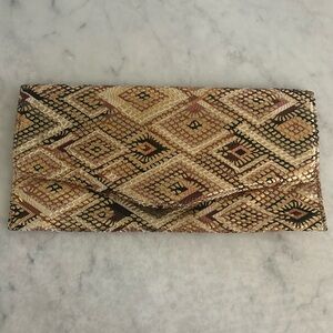 Gold embellished clutch in excellent condition
